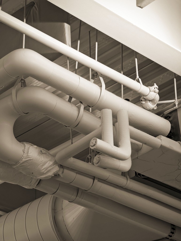 White industrial pipes and ductwork